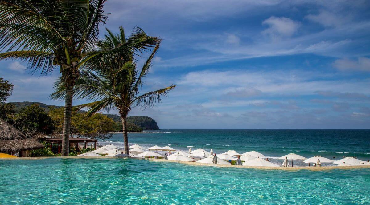 The pool overlooking the beach at Kupuri Beach Club in Punta Mita