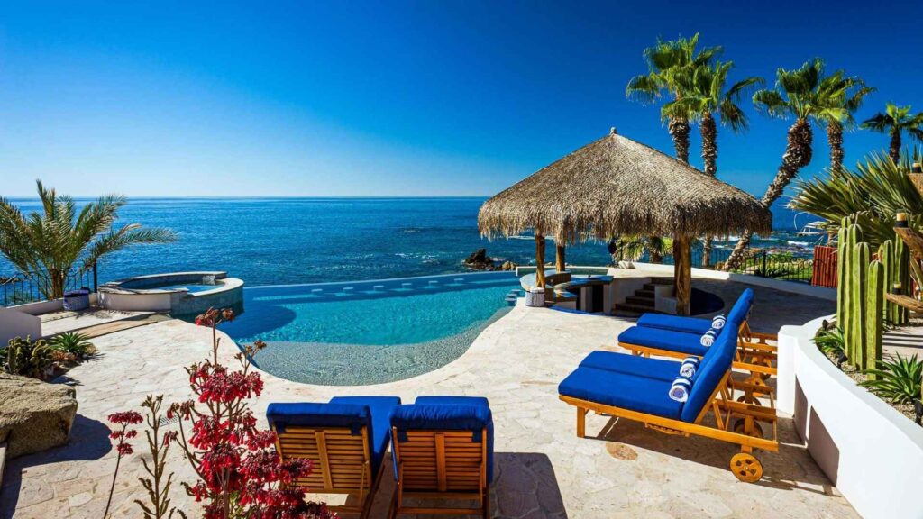 Luxury Los Cabos villa with infinity pool overlooking the Sea of Cortez at sunset